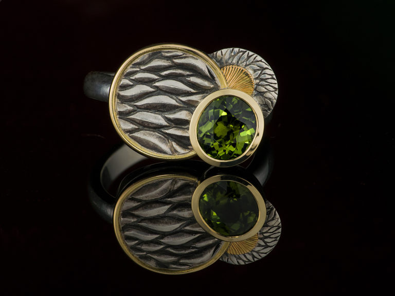 peridot ring in silver and gold